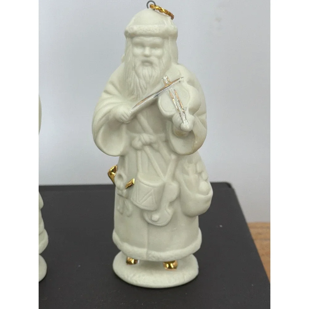 Set of 4 Vintage Bisque Porcelain Santa Claus Figurines Gold Accents Ornaments